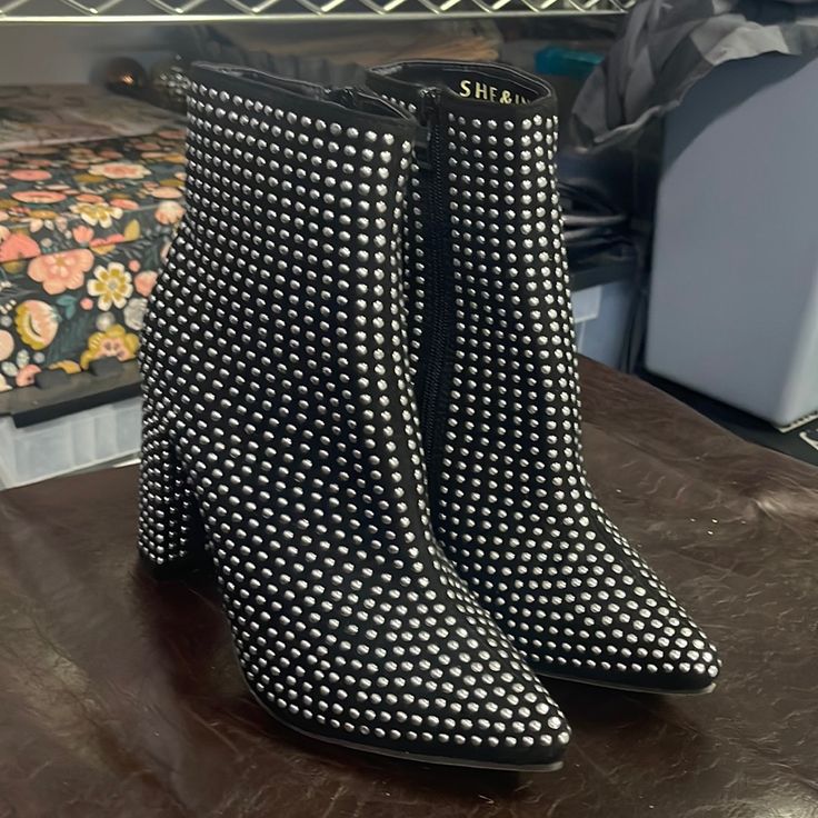 Silver Studded Black Ankle Booties. Never Worn Silver Boots With Metal Feet For Night Out, Silver Ankle Boot Heels For Fall, Silver High Ankle Boots For Party, Evening Boots With Silver Studs And Round Toe, Trendy Silver Heels For Fall, Silver Studded Boots For Fall, Party Boots With Silver Studs And Round Toe, Silver Studded Boots For Night Out, Edgy Party Boots With Silver Studs