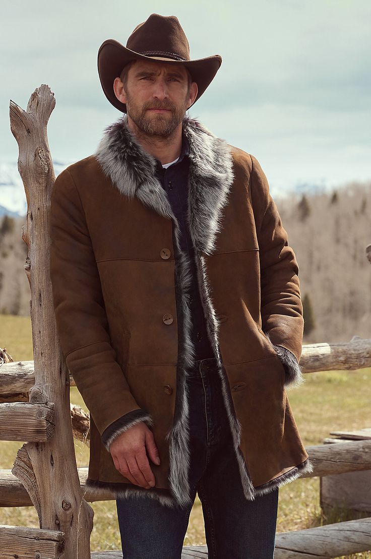 The Jackson sheepskin coat exudes a timeless appeal, from its oversized collar to its rugged raw-edge seams at the cuffs and hem. Touting a longer length, this plush Toscana sheepskin coat is designed for extra coverage and maximum insulation, whether you're walking the perimeter of the ranch or crisscrossing the jumbled blocks of a modern city. Luxury Casual Sheepskin Outerwear, Classic Long Sleeve Sheepskin Outerwear, Rugged Sheepskin Outerwear With Long Sleeves, Brown Sheepskin Long Sleeve Outerwear, Rugged Brown Sheepskin Outerwear, Off Grid Survival, Outdoor Clothes, Coat For Men, Oversized Collar