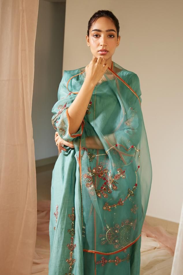 Blue dupatta crafted in organza silk base with floral, mandala hand embroidery.
Components: 1
Pattern: Hand Embroidery
Type Of Work: Floral
Fabric: Organza Silk
Color: Blue
Other Details: 
Model height: 5 ft 8 inches, wearing size L
Note: Kurta and pant worn by the model is not for sale
Occasion: Puja - Aza Fashions Luxury Slub Silk Dupatta With Printed Motifs, Blue Dupatta, Floral Mandala, Not For Sale, Floral Fabric, Aza Fashion, Model Height, Floral Embroidery, Blue Floral