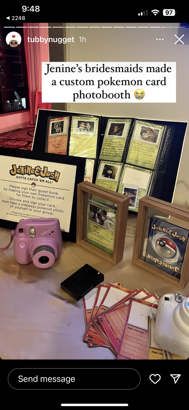 a table topped with pictures and cards next to a camera