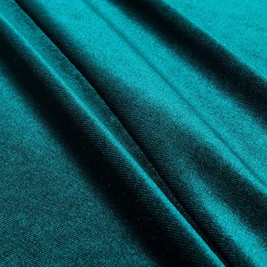 a close up shot of the teal green fabric