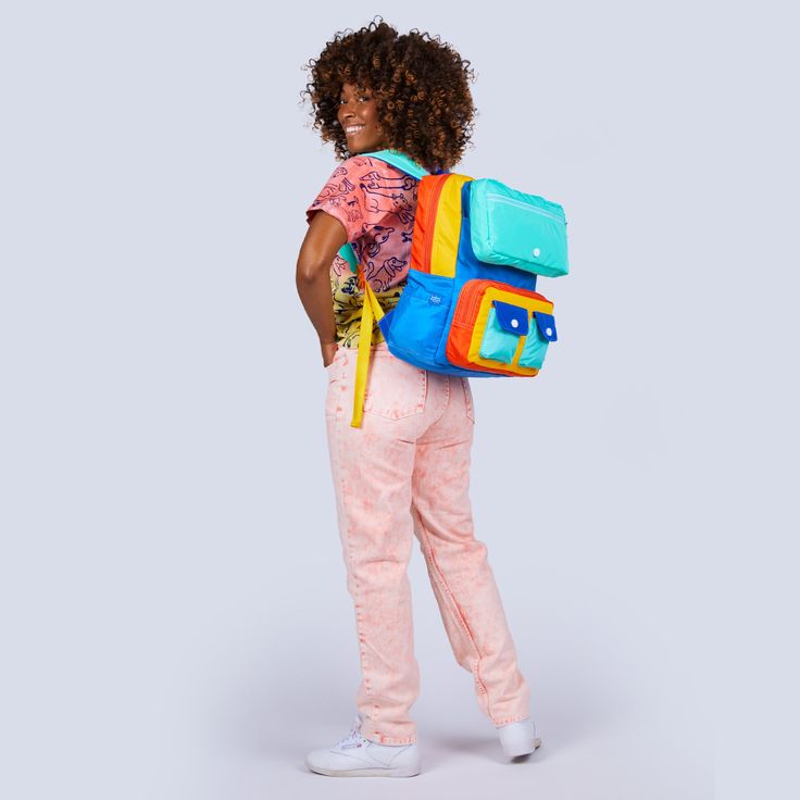 This item, once sold out, will be discontinued and will not return. The Snacktime color way is being discontinued and will not return once the remaining items have sold. Find ultimate functionality in our Faux Roll Top backpack. Benefit from the look of a Roll Top style backpack without the hassle of multiple step access. Lift up the magnetic top zippered pocket to find a hidden flat slot! The front bottom double pull zip compartment is great for quick access to your phone, keys, and wallet. Sta Playful Backpack For Daily Use, Playful Standard Backpack For Daily Use, Playful Nylon Standard Backpack, Back To School Color Block Standard Backpack, Multicolor Color Block Backpack, Playful Multicolor Standard Backpack, Travel Backpack With Color Block, School Backpack With Color Block Design, Playful Backpack For Students