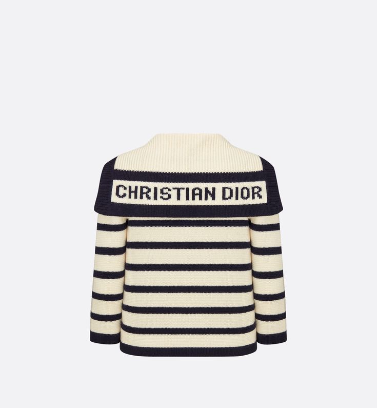 The virgin wool and cashmere knit Dior Marinière cardigan is adorned with the timeless D-Stripes motif in navy blue and ecru. Its cropped, fitted cut features contrasting navy blue edges and a sailor collar with the Christian Dior signature. Classic and modern at the same time, the cardigan will complete any outfit through the seasons.. 36 Dior Cardigan, Dior Sweater, Denim Swimsuit, Blanket Poncho, Icon Shoes, Dior Book Tote, Christian Dior Couture, Sailor Collar, Short Denim