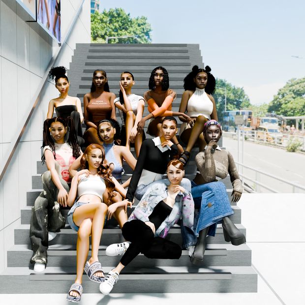 a group of young women sitting on top of stairs next to each other in front of a building