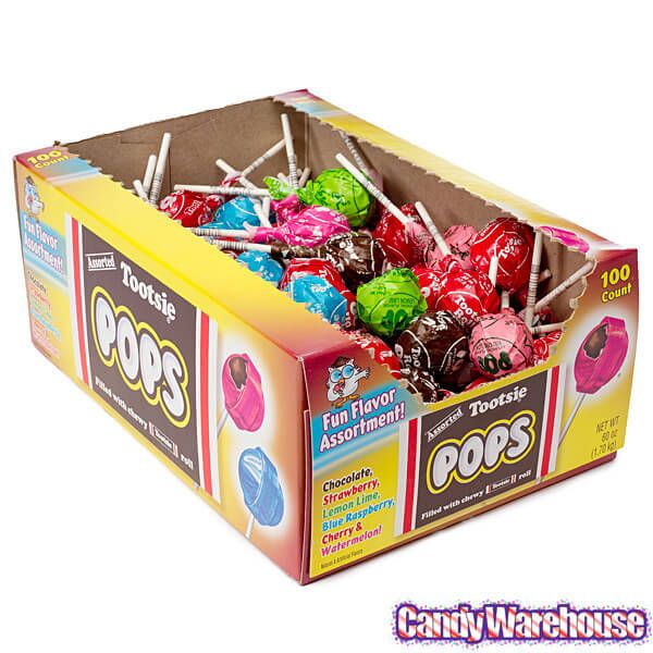 a box filled with assorted candy lollipops