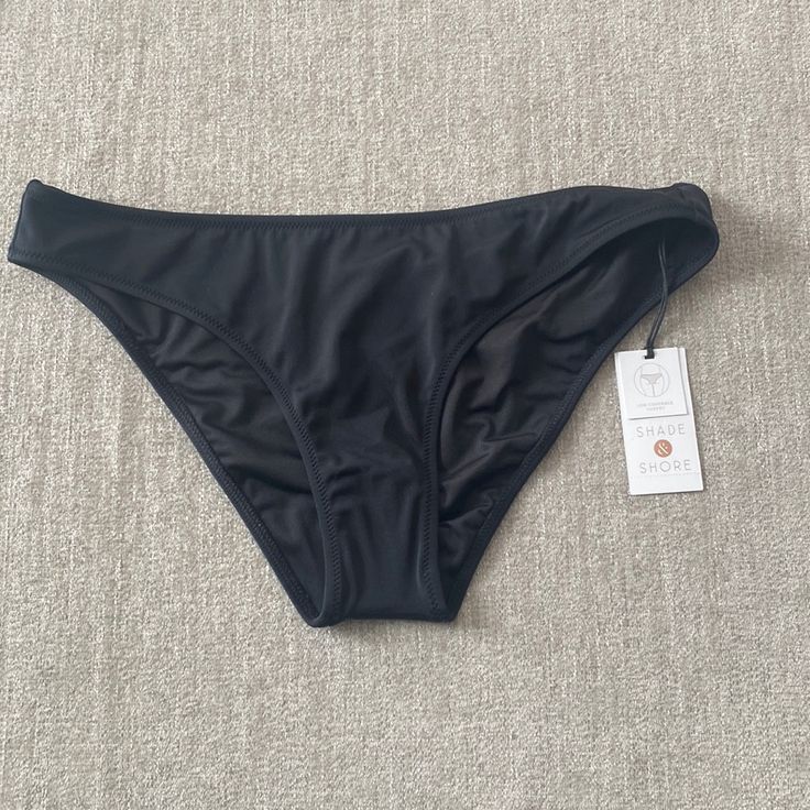 Shore & Shade Black Bikini Bottoms Size Medium Nwt. Black Beach Bottoms With Lined Body, Black Stretch Tankini With Brief Bottom, Black Stretch Tankini With Brief, Black Stretch Brief Swimwear, Black Swimwear Brief With Lined Body, Black Brief Tankini For Poolside, Black Tankini For Poolside, Black Swimwear Briefs For Sunbathing, Black Fitted Brief Swimwear