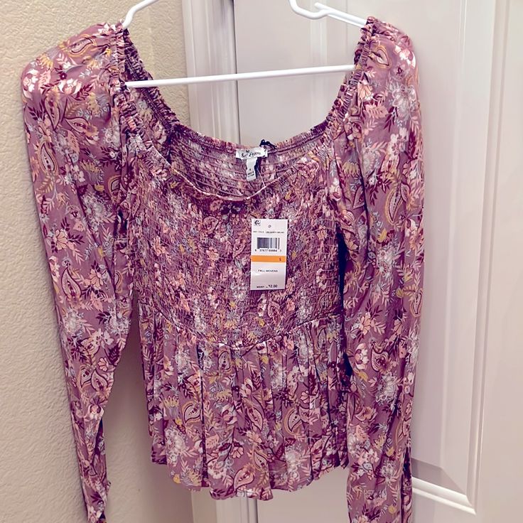 Purple Floral Peplum Blouse! Brand New! Casual Printed Purple Tops, Casual Purple Printed Tops, Purple Floral Print Top For Day Out, Mauve Long Sleeve Tops, Flowy Purple Tops, Trendy Purple Printed Top, Feminine Purple Top With Floral Print, Spring Purple Printed Blouse, Fitted Printed Purple Tops