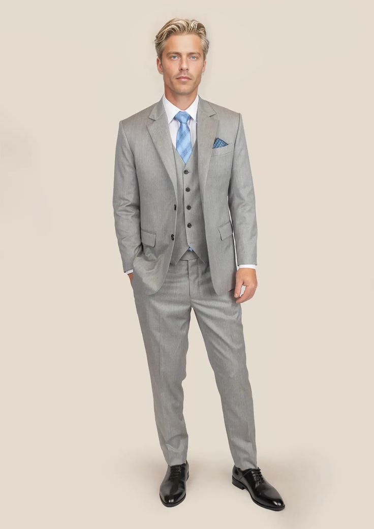 Elevate your wardrobe with our premium Glacier Grey Twill Suit. Cut from luxurious, Super 110s 100% merino wool by Vitale Barberis Canonico; this custom-made suit exudes sophistication and classic style. Perfect for any occasion, its versatility will easily take you from day to night. Wedding Three-piece Suit With Welt Pockets, Timeless Business Suit Set With Notch Lapel, Elegant Wool Three-piece Suit, Single Breasted, Elegant Single Breasted Wool Three-piece Suit, Elegant Wool Three-piece Suit Single Breasted, Timeless Fitted Three-piece Suit With Concealed Placket, Elegant Single-breasted Wool Three-piece Suit, Classic Slim Fit Suit With Notch Lapel, Classic Slim Fit Double Breasted Suit With Notch Lapel