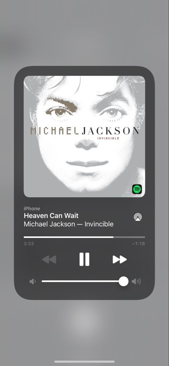 an mp3 player with the words michael jackson on it's screen and headphones