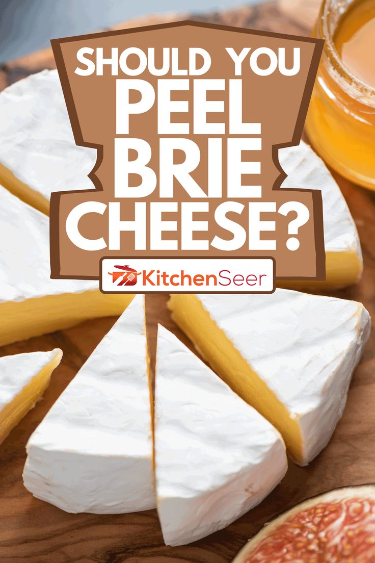 cheese on a cutting board with the words, should you peel brie cheese?