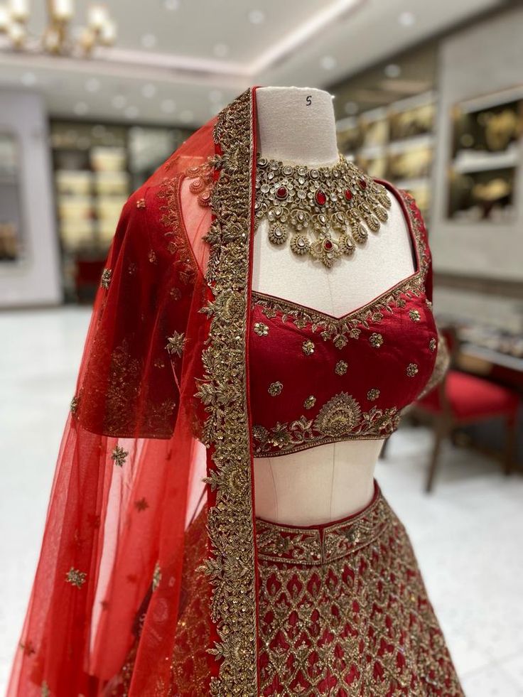 Elevate your wedding look with our Maroon Bridal Lehenga BL-104. This luxurious piece combines maroon and intricate gold embroidery, evoking a sense of regal beauty. The high-quality fabric and handcrafted details make for a truly exquisite and timeless ensemble. Make a statement on your special day with our Lehenga. Fabric: Raw Silk! WASH CARE INSTRUCTIONS - Please Dry clean only when it is applicable! Ready to Ship! Maroon Bridal Lehenga, Lengha Blouse, Lengha Blouse Designs, Maroon Lehenga, Choli Blouse, Lehenga Fabric, Maroon Blouse, Lehenga Blouse, Wedding Look