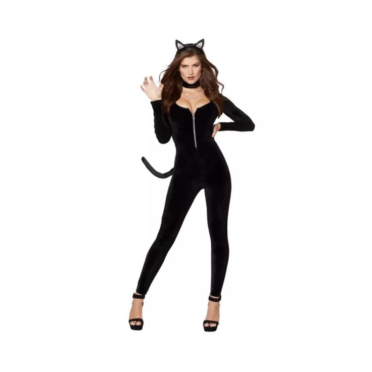 a woman in a black cat costume is posing for the camera with her hands on her hips