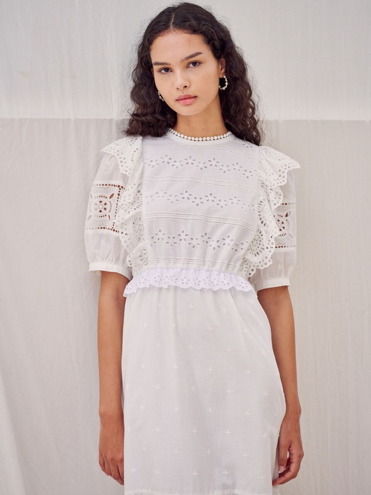 Editor's NotesThis cotton lace dress has multiple pattern laces and frills addressing lovely romantic look. The slight volumed silhouette giving comfortable fit it is perfect piece to have to keep you in style.- Embroidery lace trims blocked- Lace frill along the armhole- Tiered hem line at skirt- Elastic band at waist with lace trim- Center back zipper closure- Puffy half sleevesMeasurements(in.)One Size (XS-M)- Total Length: 47.05 in.- Bust: 37.80 in.- Waist: 26.97 in.- Shoulder: 13.78 in.- Sleeve Length: 11.02 in.- Cuff Circumference: 11.81 in.*Measurements may not fully match and differentiate from 0.4 - 0.8.*Model info: Height 5' 8.9, Bust 32, Waist 23Composition & Care- 100% Cotton- Dry clean or hand wash in cold water- Do not tumble dry- Dry flat in shadeDesigner- by N Spring Daywear Lace Dress With Ruffles, Puff Sleeve Dress With Lace Trim For Garden Party, Spring Lace Dress With Ruffles For Daywear, Feminine Eyelet Dress With Short Sleeves, Short Sleeve Puff Dress With Lace Trim, Lace Puff Sleeve Dress With Lace Trim, Feminine Short Sleeve Lace Dress With Ruffles, Feminine Lace Puff Sleeve Dress For Summer, Short Sleeve Lace Puff Sleeve Dress With Lace Trim