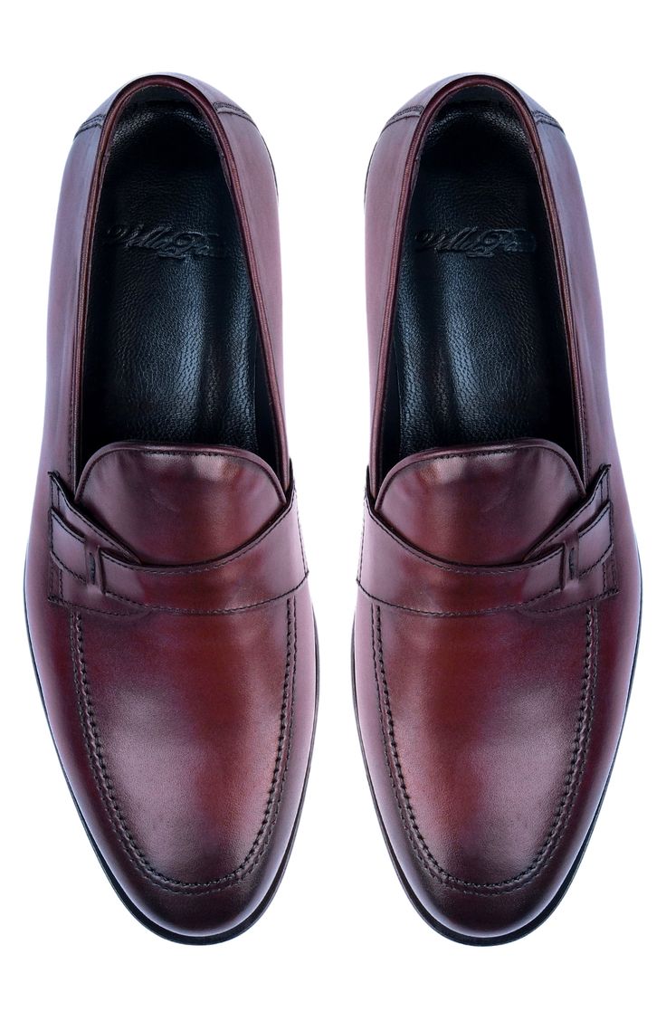 Bring polished style to your wardrobe with this smooth leather loafer featuring a cushioned footbed for superior comfort. Leather upper and lining/synthetic sole Imported Classic Closed Toe Loafers With Cushioned Footbed, Classic Closed Toe Dress Shoes With Cushioned Footbed, Classic Red Leather Slip-ons, Classic Red Tassel Loafers For Business, Semi-formal Slip-on Moccasins With Removable Insole, Classic Red Loafers For Semi-formal Occasions, Classic Red Moc Toe Loafers, Red Moc Toe Dress Shoes For Formal Occasions, Red Leather Moc Toe Loafers