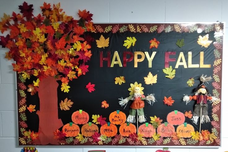 a happy fall bulletin board with pumpkins, leaves and scarecrows on it