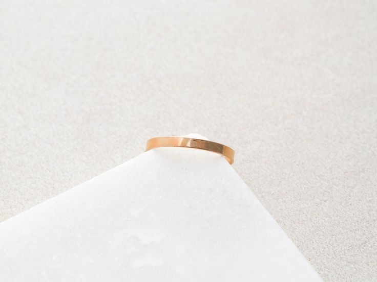 Our simple and dainty Solid Flat Band Ring can be layered with any of our stacking rings. Made with gold filled and sterling silver materials means they can be worn with minimal maintenance. This ring is also available with engraving and personalization, see other listings on our site.• Ring is about 2.5mm tall• Whole ring sizes in 4, 5, 6, 7, 8, 9These have been known to run on the small side, size up if between sizes. *if you are unsure of the ring size we have a printable PDF ring sizer, clic Minimalist Hammered Midi Rings As Gift, Minimalist Hammered 14k Gold Stackable Rings, Minimalist Hammered Stackable Rings In Recycled Gold, Minimalist Recycled Gold Stackable Toe Rings, Minimalist Yellow Gold Toe Ring Bands, Minimalist Everyday Midi Rings In Recycled Gold, Minimalist Everyday Recycled Gold Midi Rings, Everyday Minimalist Midi Rings In Recycled Gold, Minimalist Stackable Rings In Recycled Gold