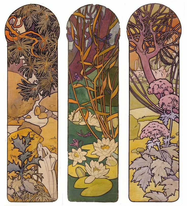 three snowboards with different designs on them, one in the shape of trees and flowers