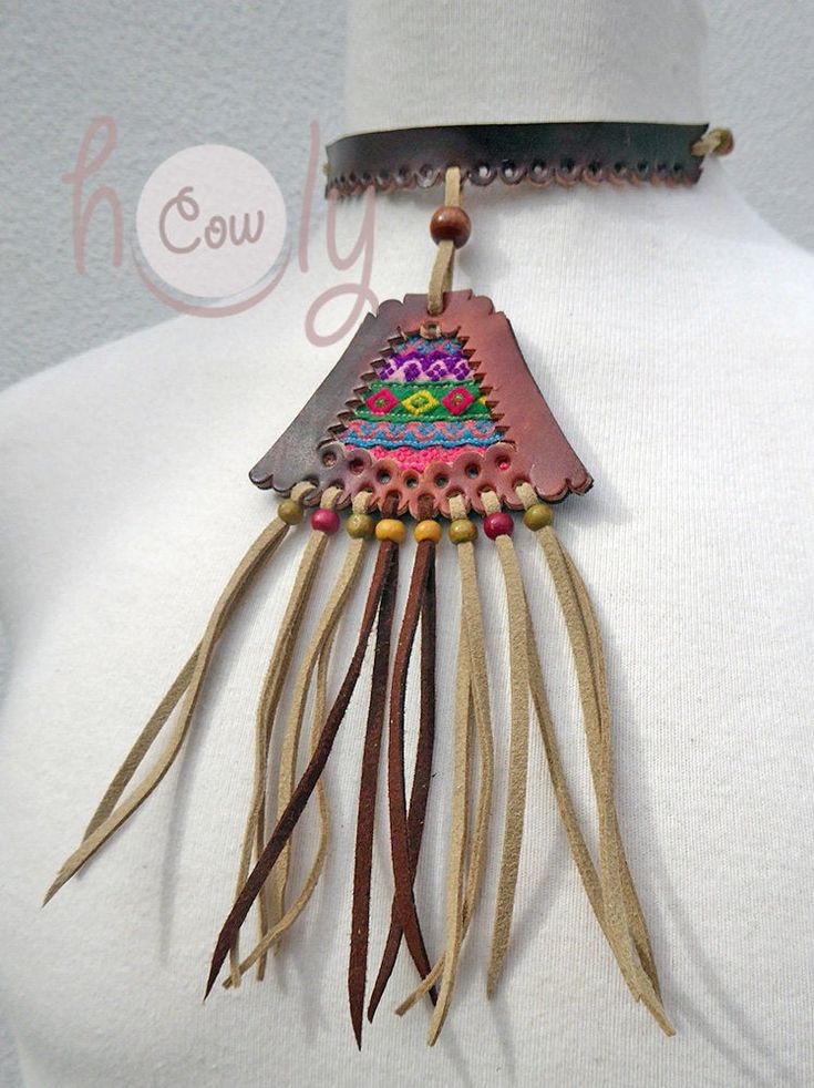 Unleash your bohemian soul with this beautiful one off unique handmade leather necklace. It is made from the finest quality brown leather. The brown leather section of the necklace has vintage hand embroidered Hmong tribal fabric incorporated into it's design. This is not only a necklace it is a piece of art. This long fringe leather choker necklace is adjustable at the back so it fits all sizes. Available in a wide range of colors. Please contact me if you would prefer a different color combina Hand-stitched Adjustable Bohemian Jewelry, Handmade Brown Bohemian Choker, Hippie Brown Jewelry For Festivals, Brown Hippie Jewelry For Festivals, Bohemian Brown Beaded Choker, Handmade Brown Hippie Necklaces, Handmade Brown Hippie Necklace, Hippie Brown Choker Jewelry, Hippie Style Brown Choker Jewelry