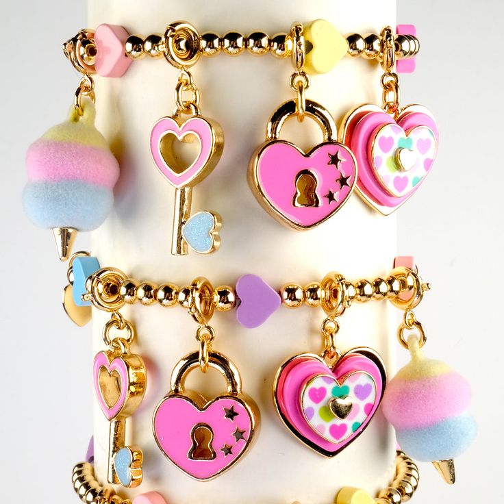 Show them just how much you HEART them with this Heart Lock charm and bring on the love and smiles! Add this charm to any CHARM IT! bracelet or necklace and customize her collection! features & materials: Enamel, Base Metal WARNING: Choking Hazard - Small parts. Not for children under 3 years. Gold Glitter Nail Polish, Unicorn Charm, Gold Glitter Nails, Disney Charms, Gold Book, Dragonfly Charm, Heart Sunglasses, Rainbow Necklace, Locket Charms