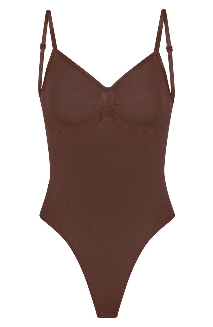 Sculpt your natural shape with a thong bodysuit that holds in your core and supports your chest flawlessly even in backless outfits. Sweetheart neck Adjustable straps 82% nylon, 18% spandex Machine wash, line dry Made in Turkey Backless Outfits, Natural Shapes, Sweetheart Neck, Low Back, Kim Kardashian, Cocoa, Adjustable Straps, Nordstrom, Spandex