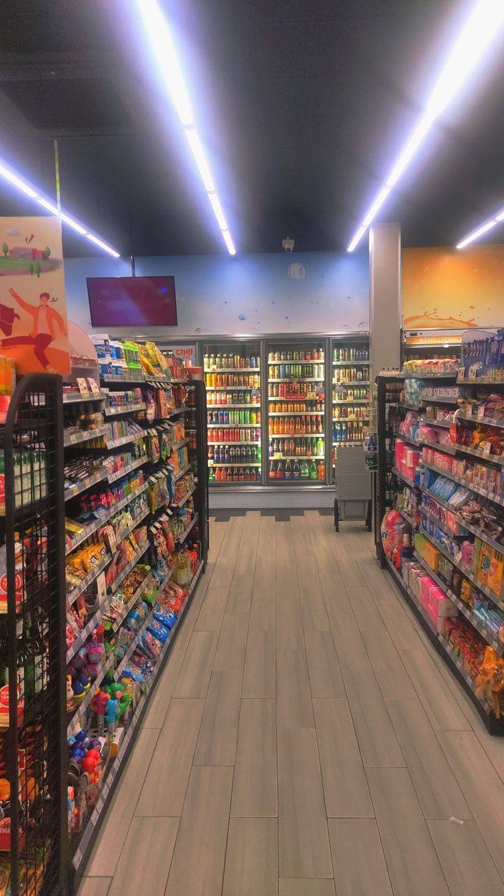 an aisle in a grocery store filled with lots of food