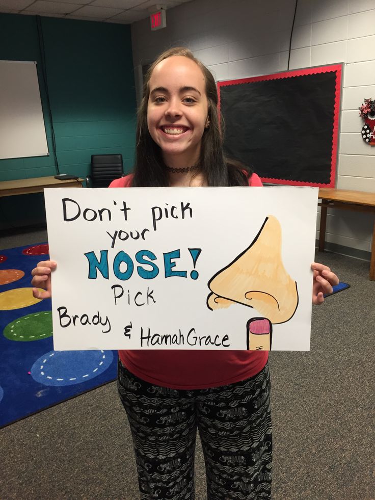 a girl holding up a sign that says don't pitch your nose pick brady and hannah grace