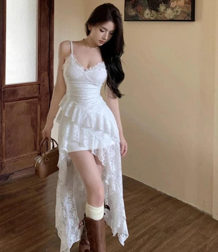 Get ready to channel your inner fairy-angel with our Daisy Wings Coquette Dress. Made with delicate white lace, this slip dress has a high-low silhouette with an open front and lace ruffles, and will make you feel whimsical and enchanting. Perfect for any fairy-themed event or just for a fun and flirty coquette look. (Fairy-angel wings not included!) Size S Bust: 74-84cm Waist: 54-68cm Length: 75/127cm; Size M Bust: 78-88cm Waist: 58-72cm Length: 76/128cm; Size L Bust: 82-92cm Waist: 62-76cm Len White Dantel Dress, New Party Dress, Fairy Outfit, Cowgirl Dresses, Aesthetic Dress, Angel Costume, Summer Party Dress, Lace Ruffle, Summer Dresses For Women