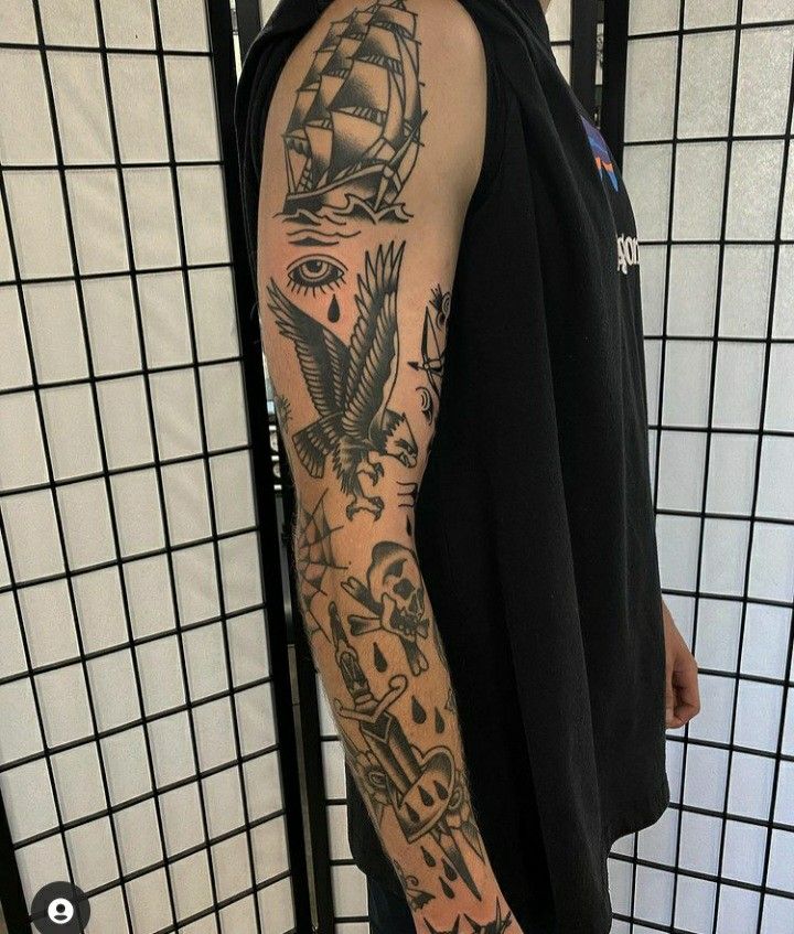 a man with a tattoo on his arm