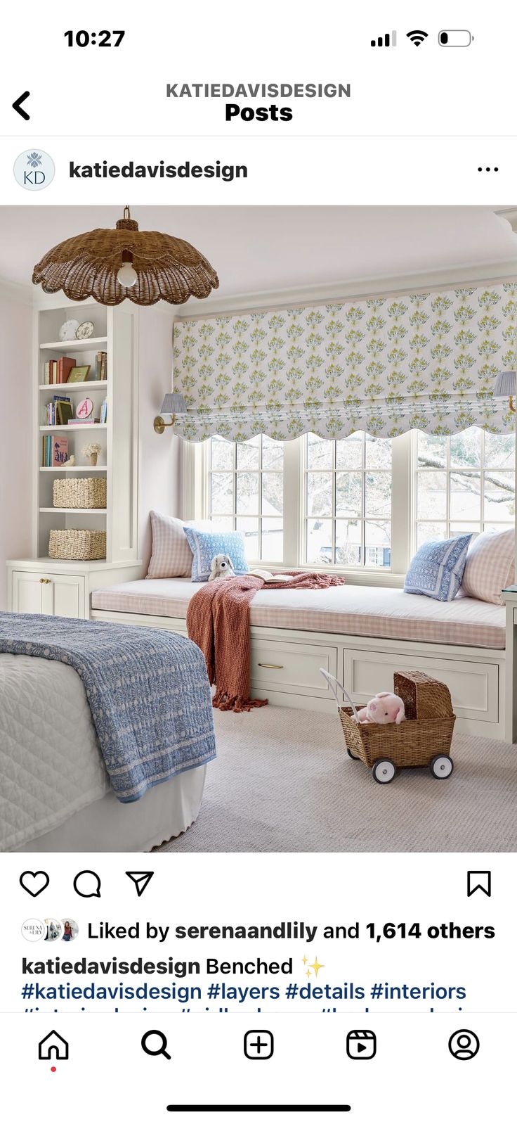 an image of a bedroom with two beds and a bookcase on the wall above it