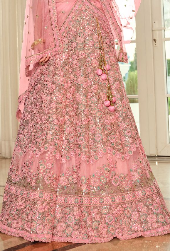 Designer heavy embroidered Bridal Lehenga Choli. Elegant and classic. LEHENGA FABRIC: Net,Handloom Silk Lehenga With Belt BLOUSE FABRIC: Handloom Silk, Net With Inner DUPATTA: Net COLOR: Pink SIZE: upto 42 inches Bust and Waist WORK: Heavy Embroidery Bonus offer - Receive a free mystery gift with your order. Stitching Option - We will email you the measurement guide to confirm your size. SHIPPING: The product will be shipped within 1 - 2 weeks from the date of purchase. Product is returnable if Navratri Floor-length Sets With Floral Embroidery, Navratri Floral Embroidery Floor-length Sets, Festive Floor-length Sets With Floral Embroidery, Festive Floor-length Choli With Floral Embroidery, Floor-length Floral Embroidery Set For Festivals, Festive Floor-length Floral Embroidered Choli, Traditional Drape Lehenga With Floral Embroidery For Eid, Floor-length Embroidered Sets For Reception, Traditional Floor-length Anarkali Set With Floral Embroidery