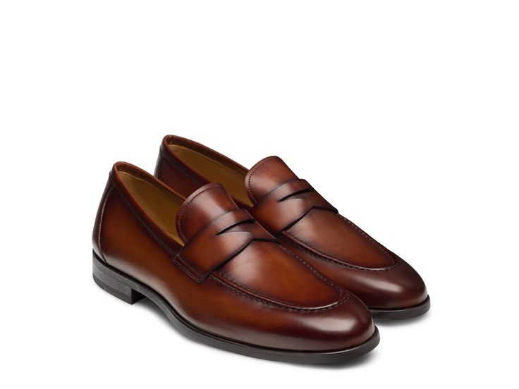 Discover timeless elegance and unparalleled craftsmanship with the Magico Penny loafer. This classic slip on epitomizes sophistication with its traditional round toe design, offering a perfect blend of comfort and style. A supple leather lining ensures a comfortable fit, while a cushioned sole provides superior support for all-day wear. Boot Straps, Loafer Sneakers, Monk Strap, Penny Loafers, Toe Designs, Shoe Care, Boot Sandals, Cognac, Loafer Shoes