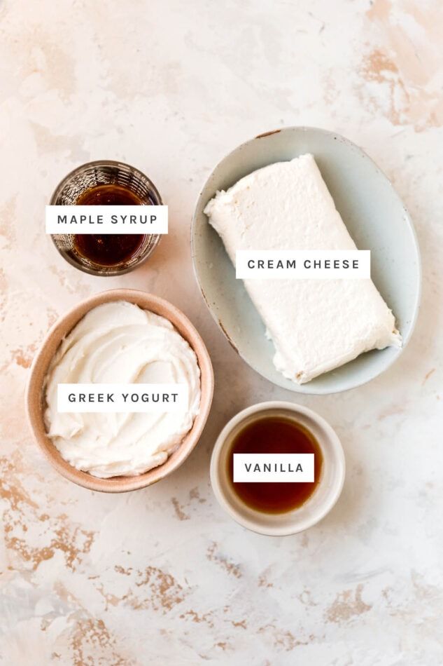 three bowls with different types of cream and sauces on them next to each other