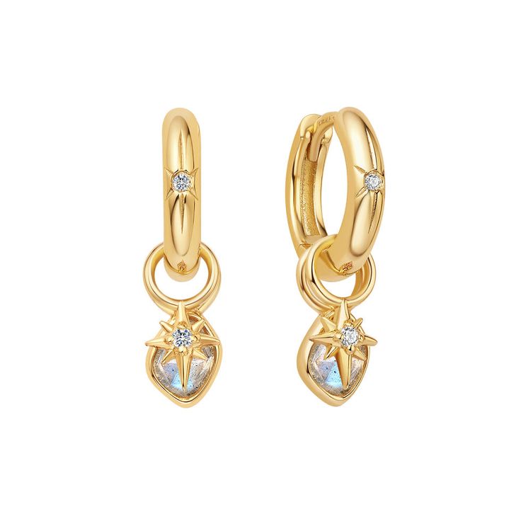 Embrace all the celestial vibes this season and add some starry sparkle to your ear party with this star charm. Set on a charm crafted from 925 sterling silver with 14kt gold plating, the delicate star is finished with sparkling cubic zirconia. Just slide the charm onto your go-to hoops or huggies. • Material: 14kt gold plated on sterling silver with cubic zirconia• Charm Size: 6.0×5.3mm• Ring diameter: 4.7mm• Weight: 0.2g Star Huggies, 3mm Ring, Charms Collection, Star Earring, Ear Party, Charm Collection, Earring Bundle, Labradorite Earrings, Cubic Zirconia Earrings