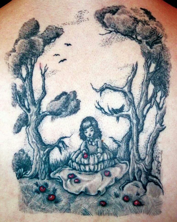 a drawing on the back of a person's shoulder