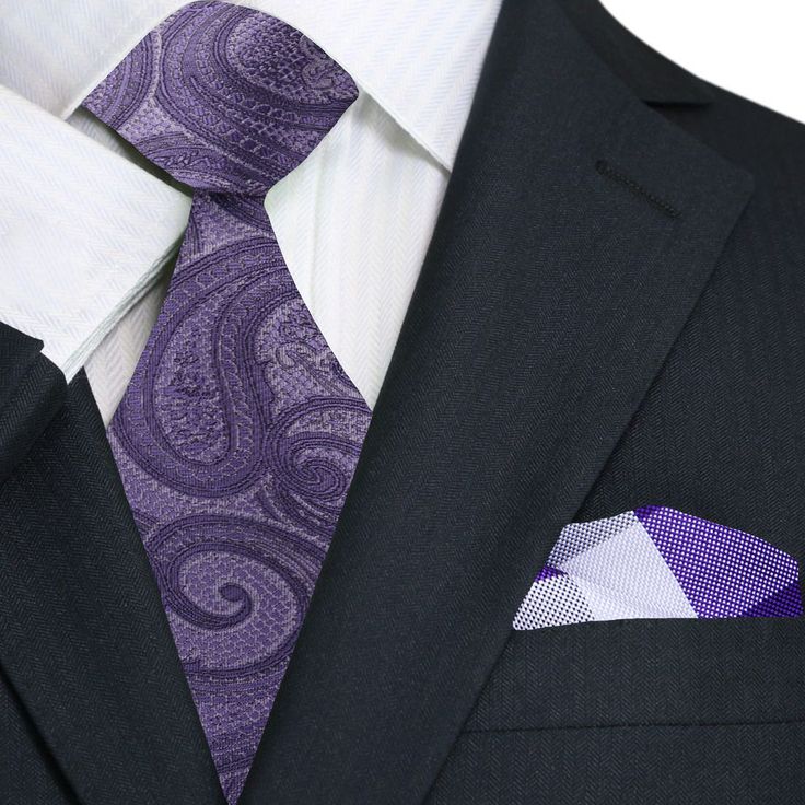 This elegant silk necktie features a refined paisley pattern in a soft purple hue. The intricate paisley design adds a touch of classic charm, while the soft purple color brings a modern and sophisticated feel. Crafted from luxurious silk, this tie offers a smooth texture and a subtle sheen, making it a versatile accessory for various formal and semi-formal occasions. Dress Shirts White Dress Shirt: A crisp white dress shirt creates a timeless and clean look, allowing the soft purple paisley pat Elegant Lavender Tie For Black Tie Events, Elegant Purple Neckwear For Black Tie Event, Elegant Lavender Suit And Tie Accessories For Business, Formal Lavender Suit And Tie Accessories, Classic Purple Neckwear For Formal Occasions, Elegant Lavender Ties For Black Tie Events, Purple Suit And Tie Accessories For Black Tie Events, Purple Standard Tie For Black Tie Events, Elegant Paisley Print Neckwear For Business