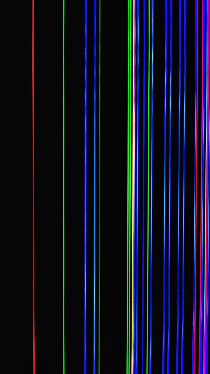 an image of multicolored lines in the dark