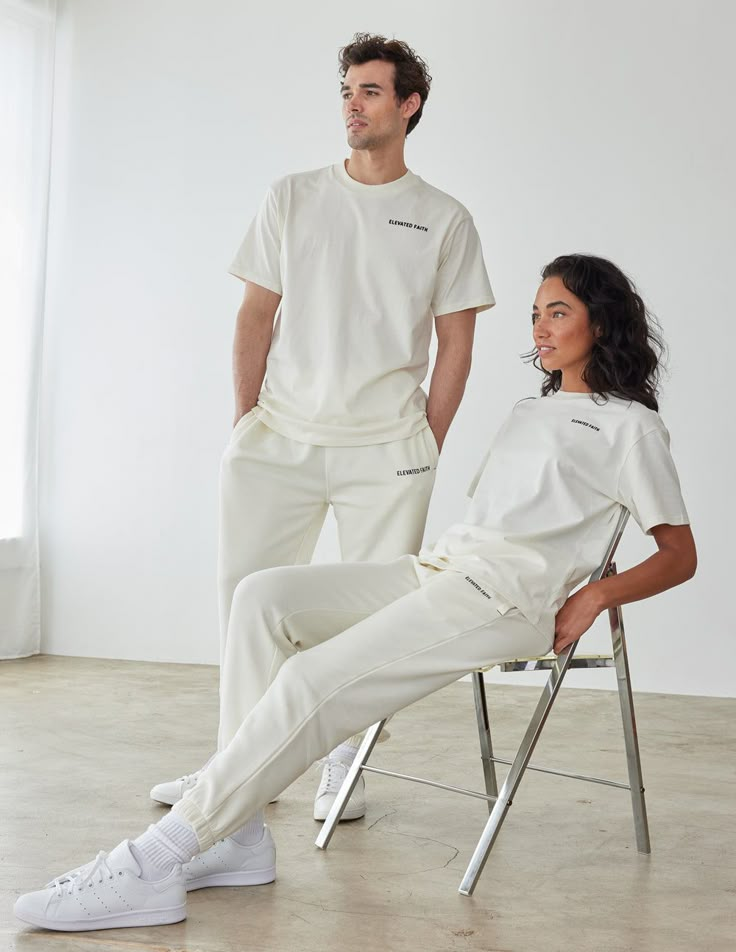 The Basics White Sand Unisex Tee is made with our Pure Cotton Jersey and is designed to be worn year-round, made to last.     Size:  Model is 5'10" and wearing a size Small. Fit:  Oversized, Unisex Fit Color:  White Sand Composition:  100% Cotton Features:  Super Soft, Pre-Shrunk ,  Flocked Screen Print  Logo on Left Chest T Shirt Model Poses, White Tshirt Photoshoot, Tshirt Merch Photoshoot, Tshirt Model Poses, T Shirt Photoshoot, Minimalist Tshirt, Express Outfits, Photoshoot Studio, Blank T Shirts