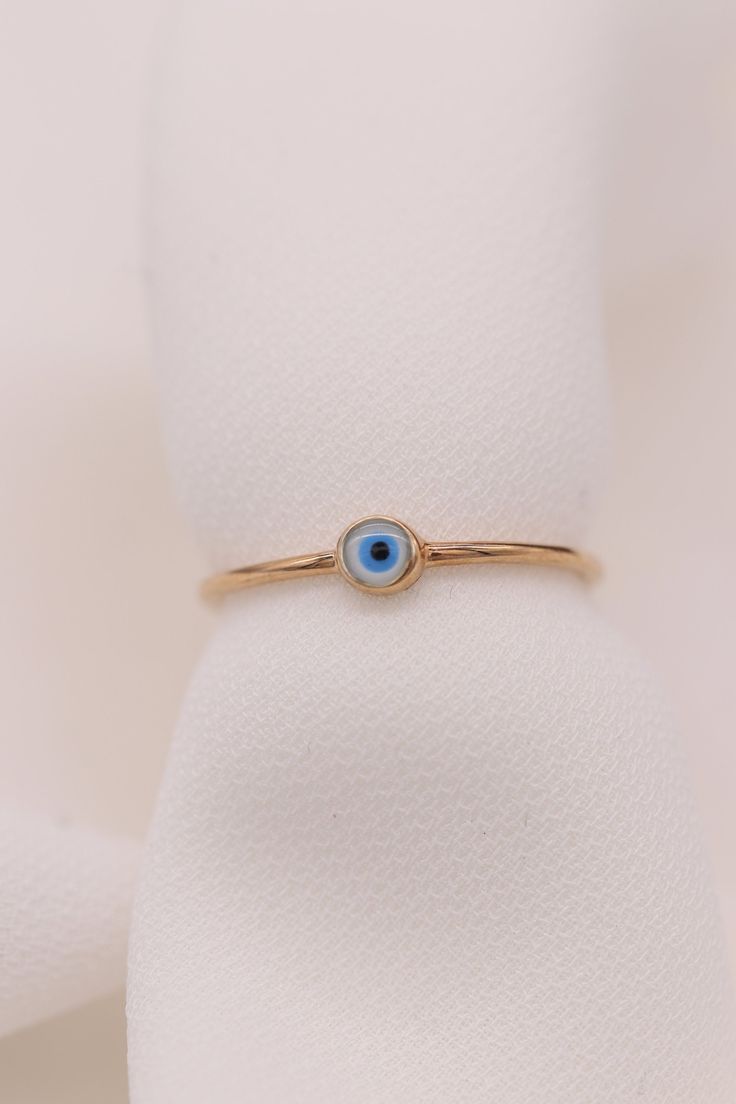 "Gold Evil Eye / Handmade Evil Eye Ring / 14k & 18k Evil Eye Ring Available in Gold, Rose and White Gold ❥ ITEM DETAILS ---> Gold Color of Choice : Yellow Gold, Rose Gold, White Gold ---> Material : 14k ( 585 ) or 18k ( 750 ) Real Gold. It is Not Gold Filled or Gold Plated ---> Made to order ---> Band Thickness : 1.05 mm ---> Band Width : 1.05 mm ---> Evil Eye Made of Enamel ---> Ship in 4 - 7 Business Days ❥ Gift Wrapping and Packaging All items are packed in the high-q 14k Rose Gold Round Jewelry For Gift, Round 14k Rose Gold Jewelry Gift, Handmade 14k White Gold Rings, 14k Rose Gold Stamped Jewelry Gift, Handmade 14k Gold Round Band Jewelry, Handmade 14k Gold Round Band Rings, 14k Rose Gold Jewelry Stamped 14k As Gift, Stackable 14k Rose Gold Jewelry As A Gift, Stackable 14k Rose Gold Jewelry Gift