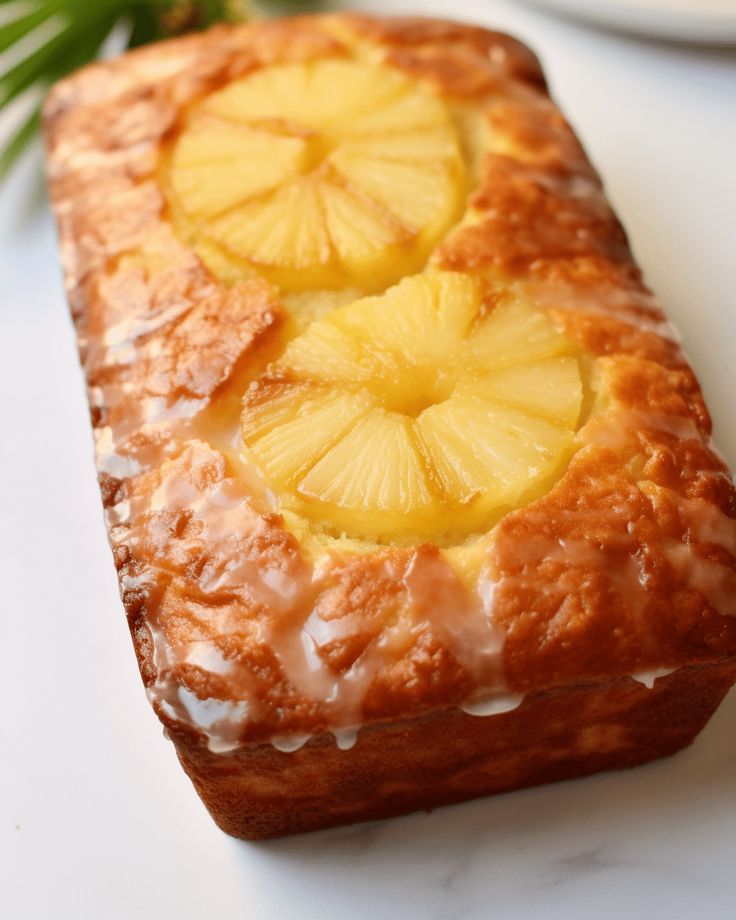 a close up of a pastry with pineapple on it