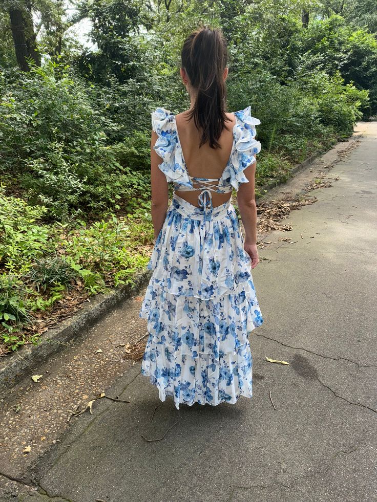 Floral ruffled maxi dress with elegant back! Kendall is wearing a size small. Summer Backless Dress With Ruffle Hem, Backless Sundress With Ruffle Hem, Fitted Maxi Dress With Ruched Back For Brunch, Backless Brunch Dress With Ruffle Hem, Backless Ruffle Hem Dress For Brunch, Fitted Backless Sundress With Ruffles, Blue Dress With Tie Back And Ruffled Straps, Fitted Floor-length Ruffle Dress For Spring, Ruffled Maxi Dress For The Beach