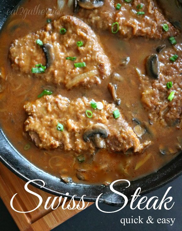 some meat and mushrooms are cooking in a skillet