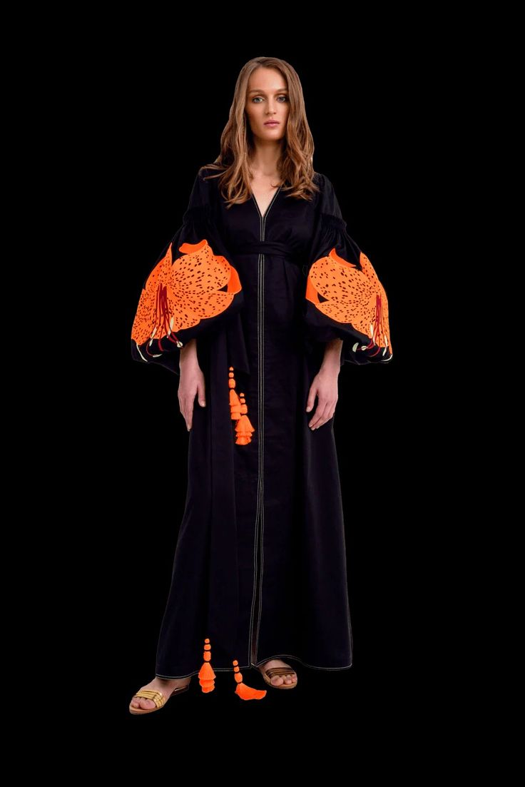 Black/Orange Luxurious Lilies Women's Maxi Caftan. Online store of fashion designer clothes for women. In legends, the lily flower is a symbol of maiden charm, purity, and virtue. Brand Yuliya Magdych, expensive designer dresses. The lily flower also hides the secret of life. Made in UKRAINE with love Yuliya Magdych, The Secret Of Life, Secret Of Life, Fashion Designer Clothes, Cotton Caftan, Designer Clothes For Women, Made In Ukraine, Women Maxi, Fashion Design Clothes