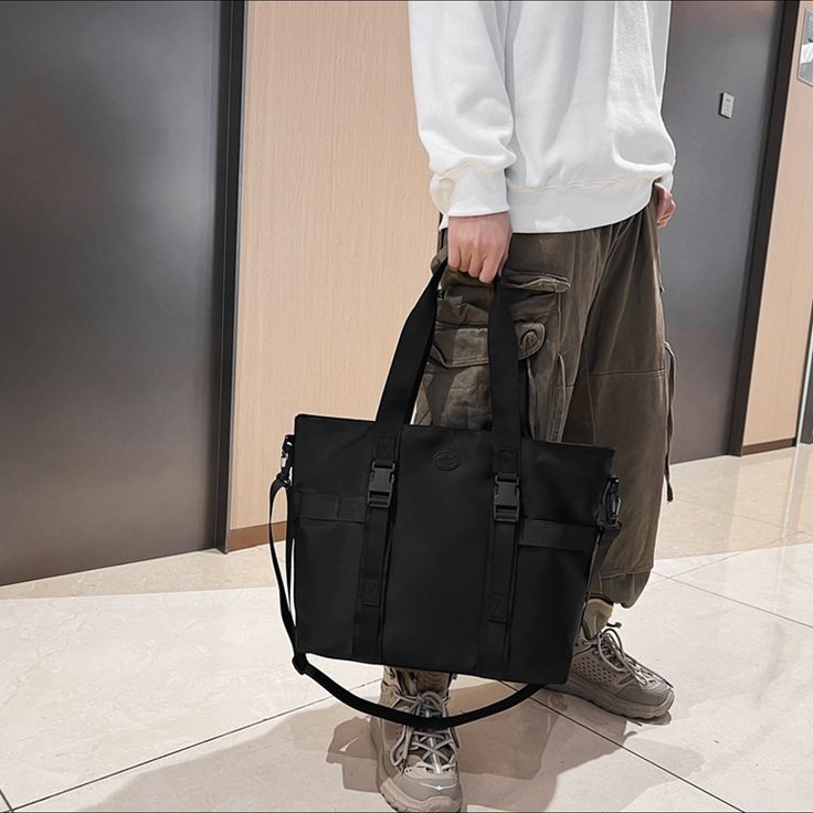 Materials: Nylon Size: 34cm X 13cm X 31cm Weight: 0.37Kg Casual Nylon Laptop Bag For On-the-go, Solid Nylon Rectangular Bag, Solid Rectangular Nylon Bag, Trendy Nylon Satchel With Large Capacity, Solid Color Rectangular Nylon Bag, Trendy Large Capacity Nylon Satchel, Large Capacity Nylon Satchel For On-the-go, Casual Nylon Satchel With Zipper Closure, Casual Nylon Bag With Large Capacity