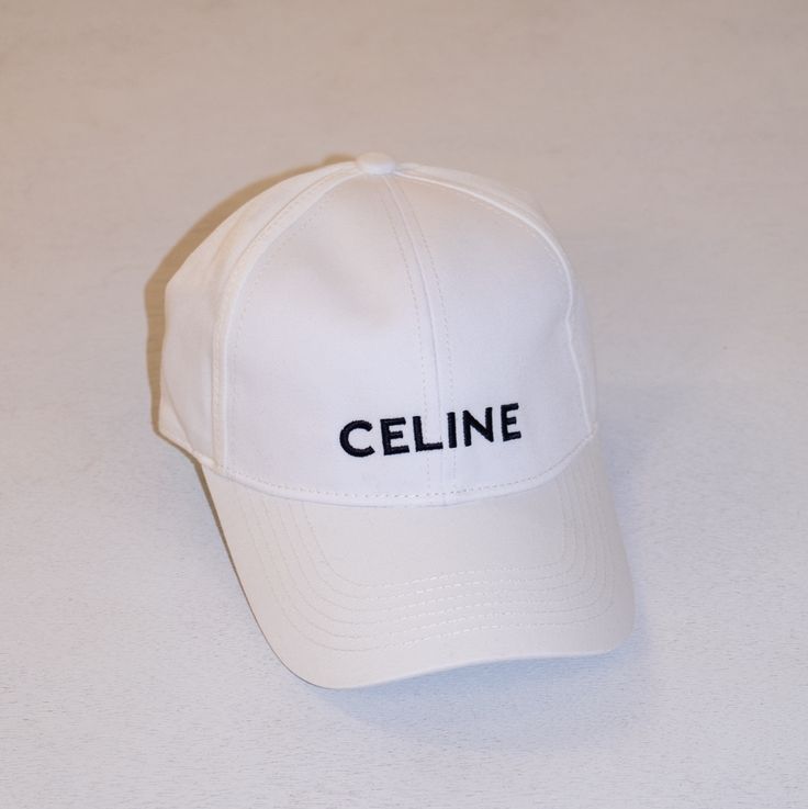 Designer Inspired Celine logo baseball cap Adjustable for the perfect fit! White Snapback Visor Hat With Letter Print, White Letter Print Snapback Visor Hat, White Letter Print Visor Snapback Hat, Classic Baseball Cap With Embroidered Logo, White Embroidered Logo Baseball Cap, Classic White Trucker Hat, Trendy White Snapback Hat With Curved Visor, White Curved Visor Hat With Letter Print, White Baseball Cap With Embroidered Logo, Adjustable Fit