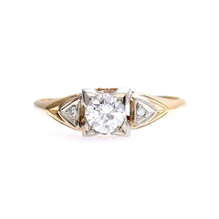 a gold and white diamond ring