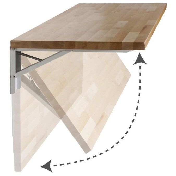 an angled view of a wooden table with two arrows pointing to the left and right