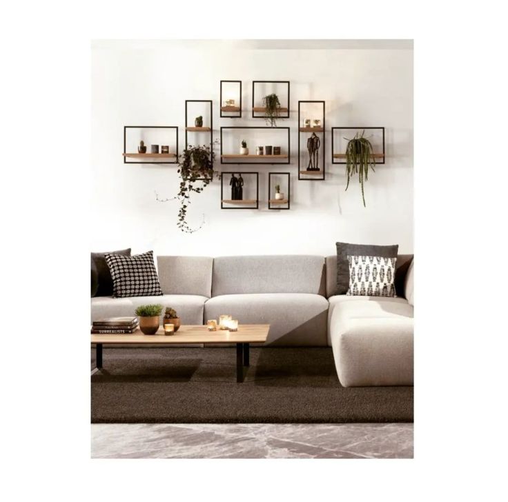 a living room scene with focus on the couch and coffee table in front of it