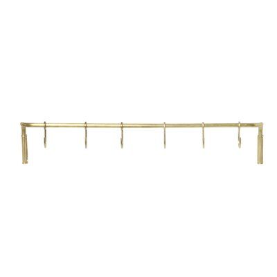 a gold metal shelf with four hooks on it