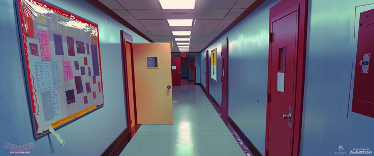 an empty hallway with red doors and posters on the wall