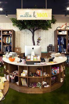 the inside of a children's clothing store with toys and accessories on display in it